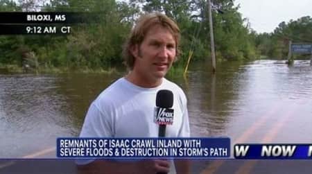 American Reporter, Phil Keating covering the news of flood in Mississippi.